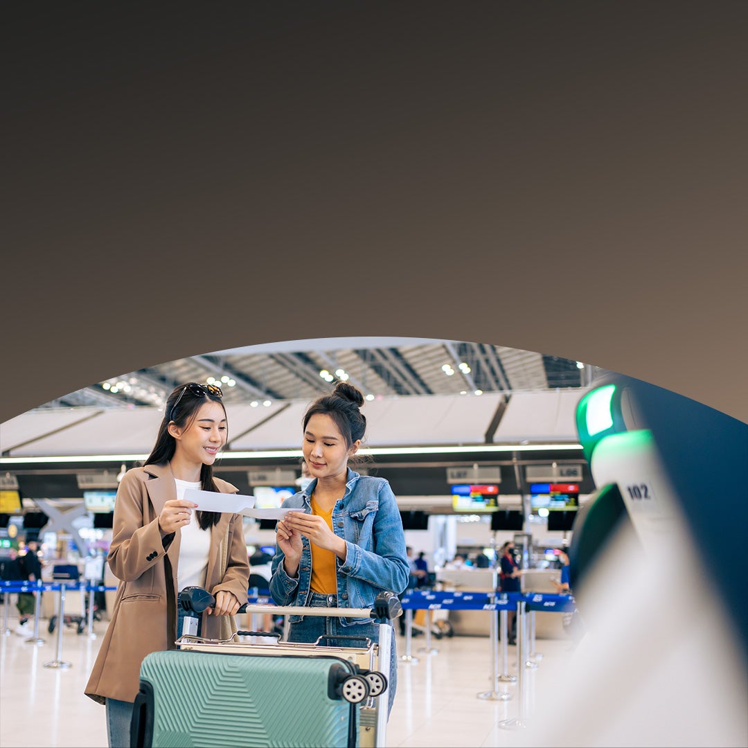 Young women passengers in airport terminal