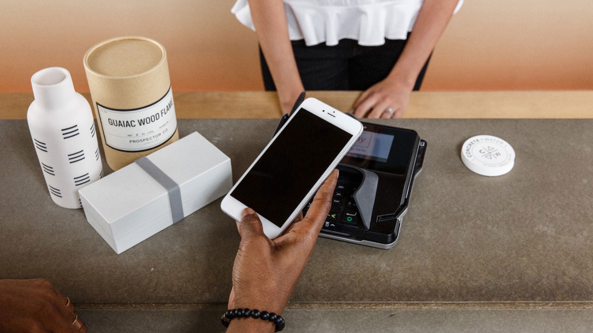 Person paying with phone
