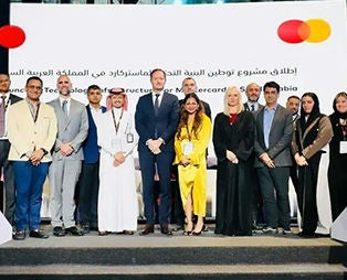 A group of people standing together for a photo at an event.