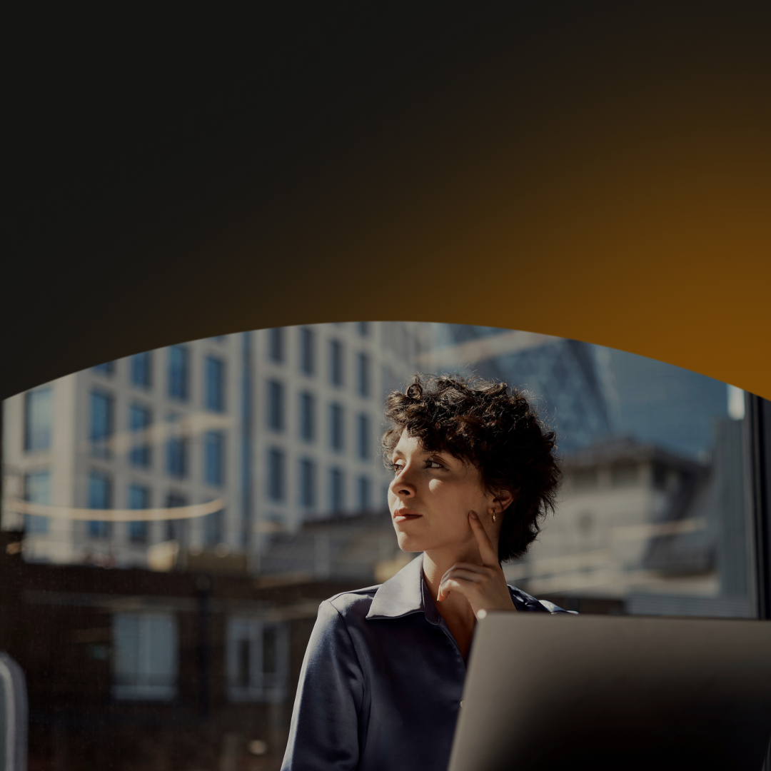 Business professionals in a meeting discussing how banks can utilize advanced cyber fraud fusion strategies to prevent cyber fraud