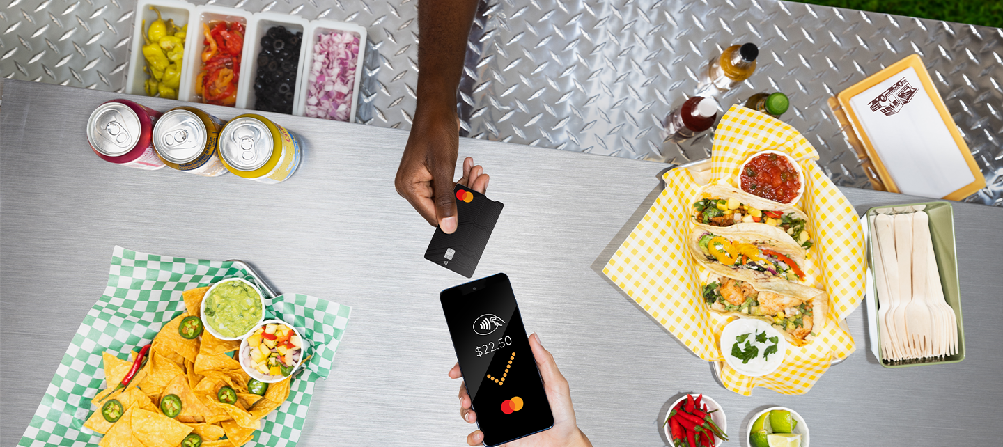 Hands paying with card