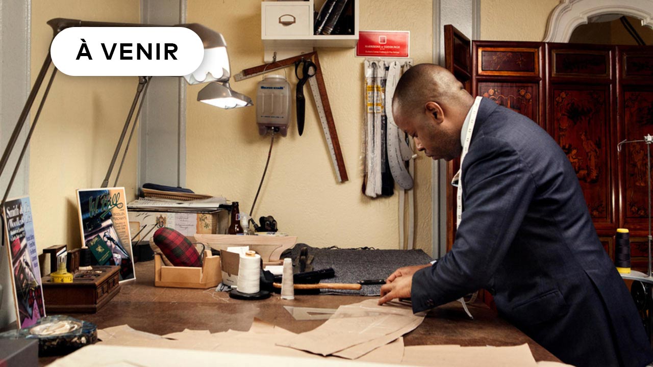 A tailor working in his workshop.