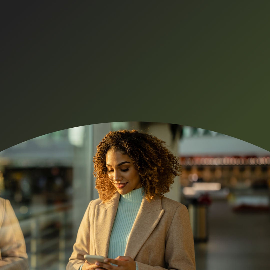 Woman on her phone outside of the office