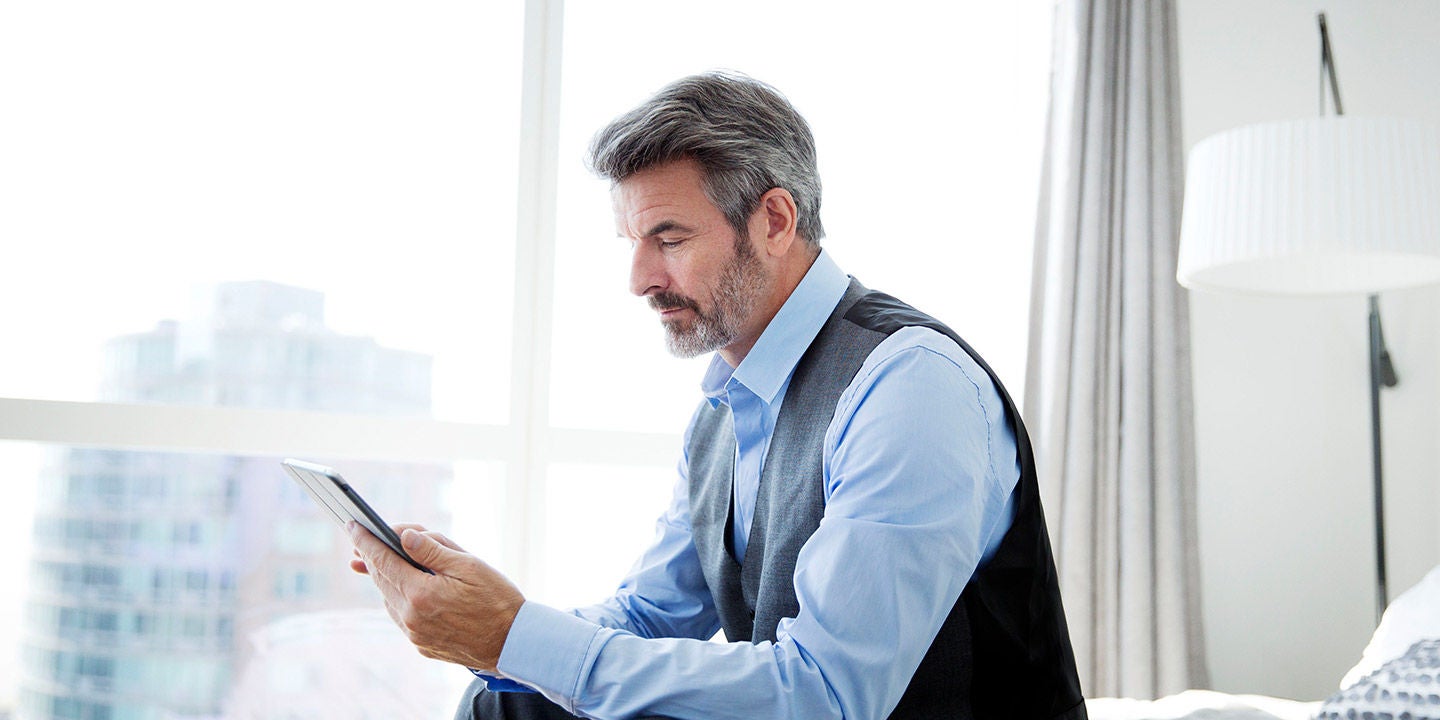 Businessman looking at a tablet