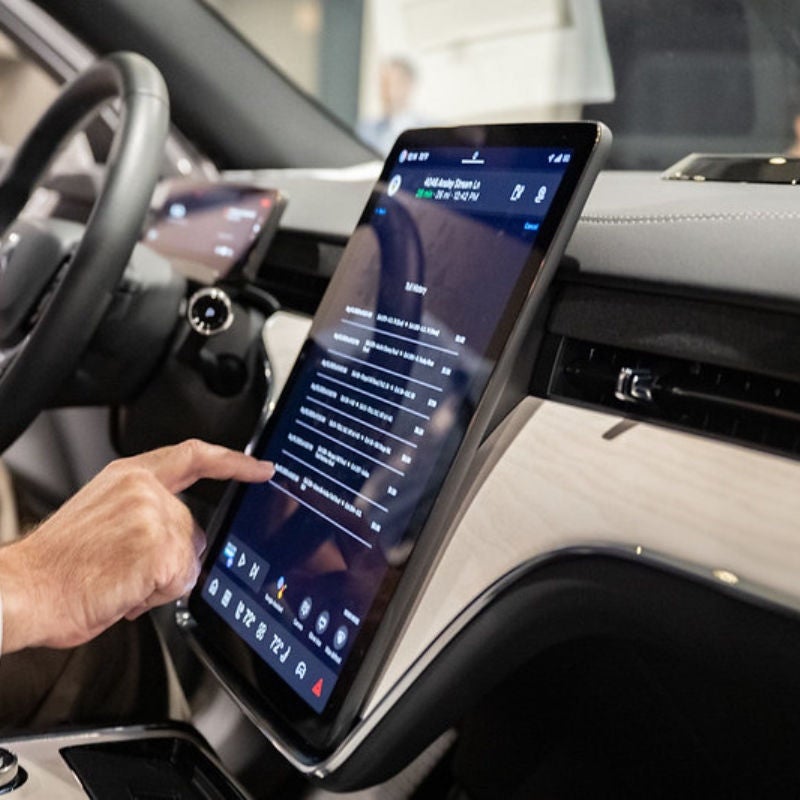A Volvo owner enters credential details for in-car payments. 