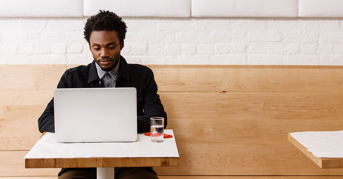 Man at computer thinking