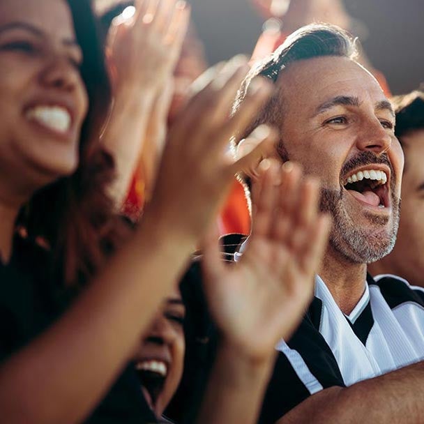 Cheering sports fans.