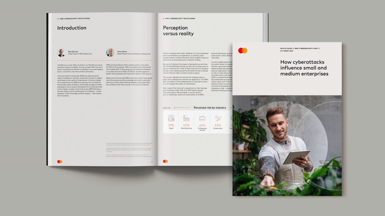 White paper cover and opened to a page. 