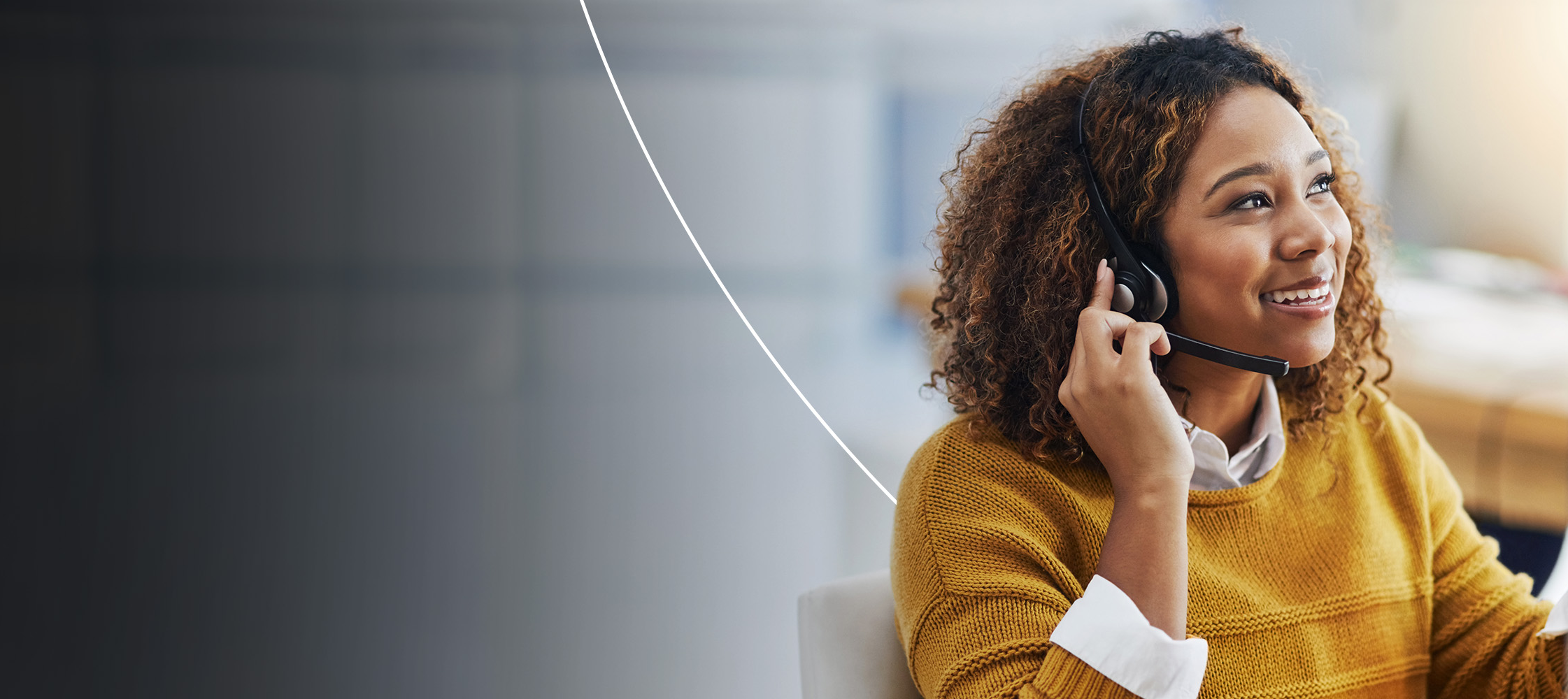Woman customer service worker helping a customer smiling