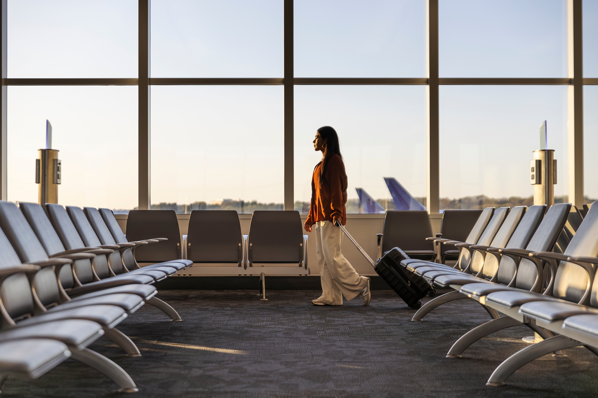 woman walking in an airport