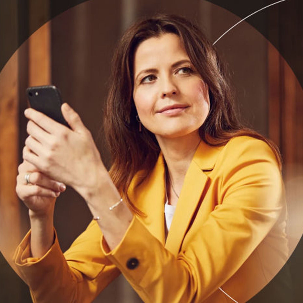 Woman looking over man's shoulder on a computer