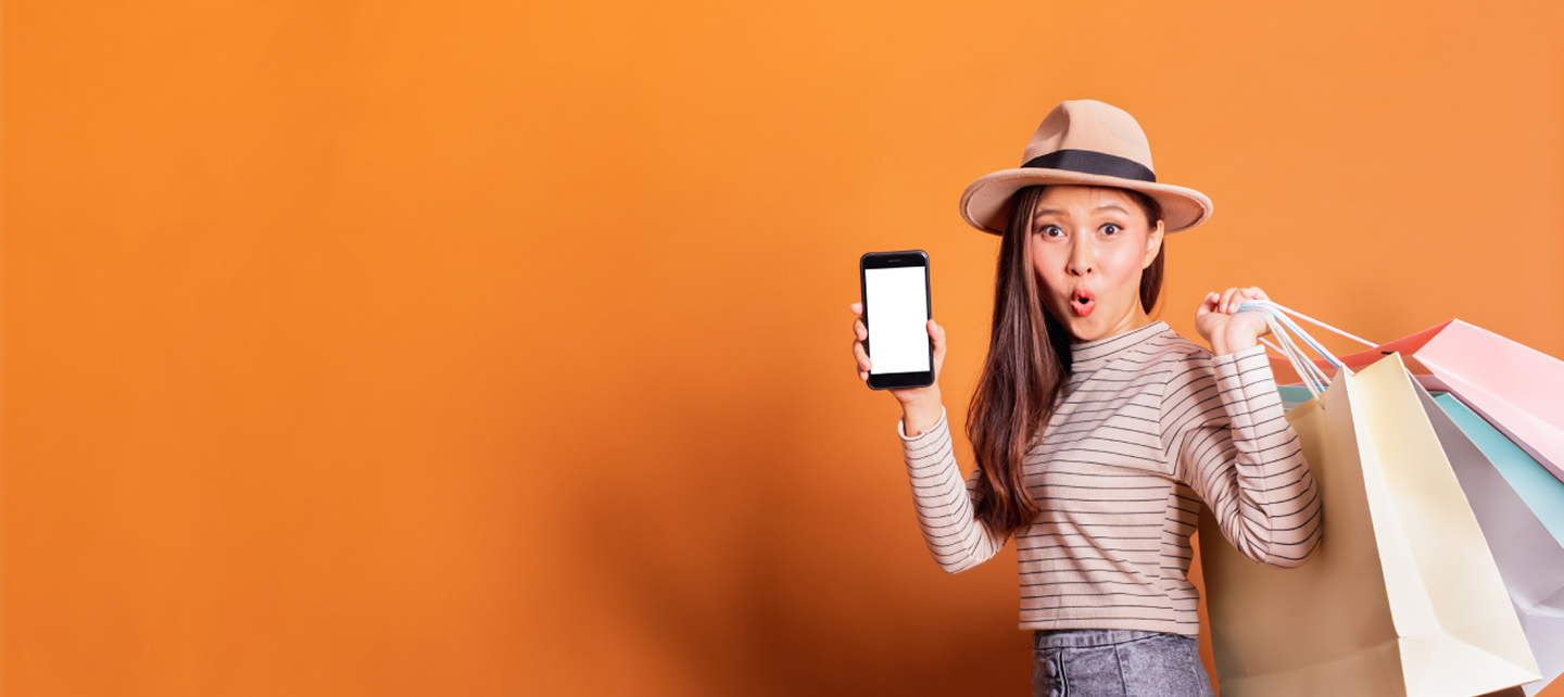Woman shopping online happily