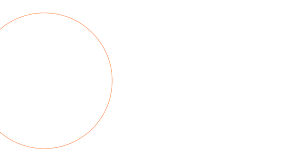 woman holding her hat facing a sunset