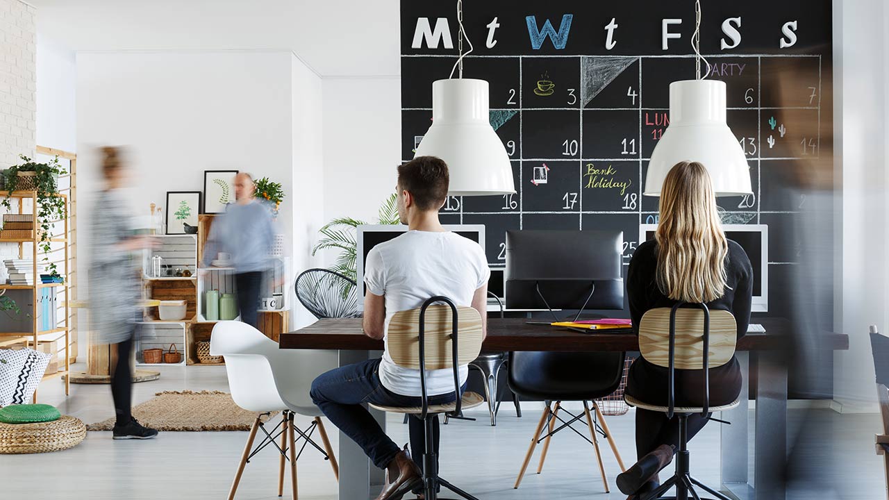 People in modern coworking space.