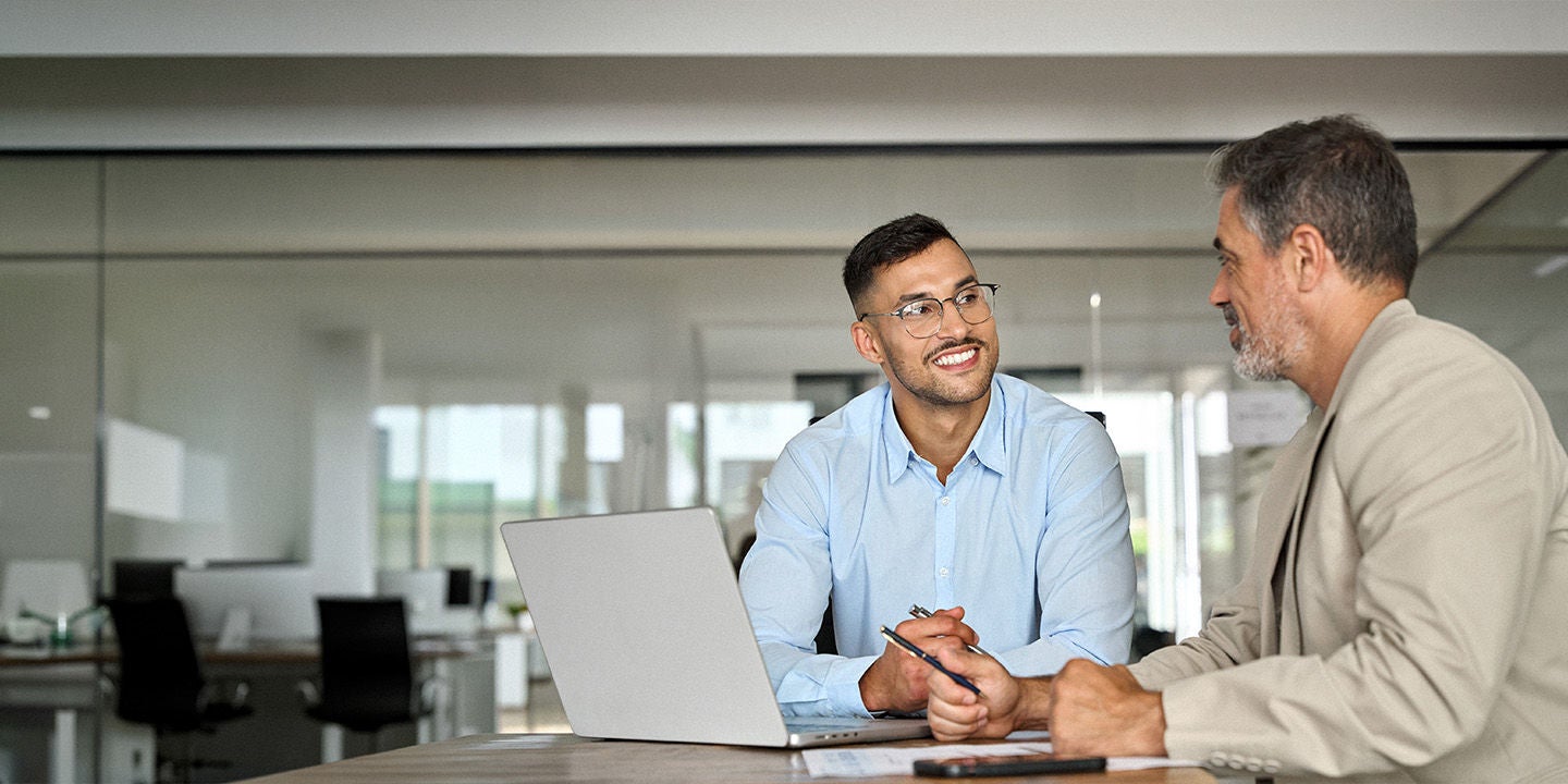 Two men working at the office