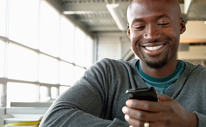 Man looking at data on phone.