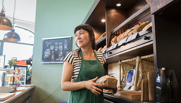Woman stocking in a store