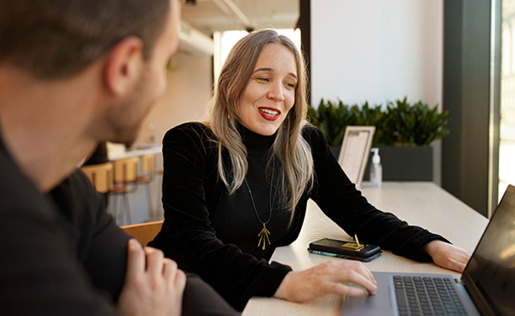 Woman explaining something at work