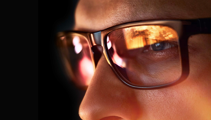 Reflection of a screen in someones glasses