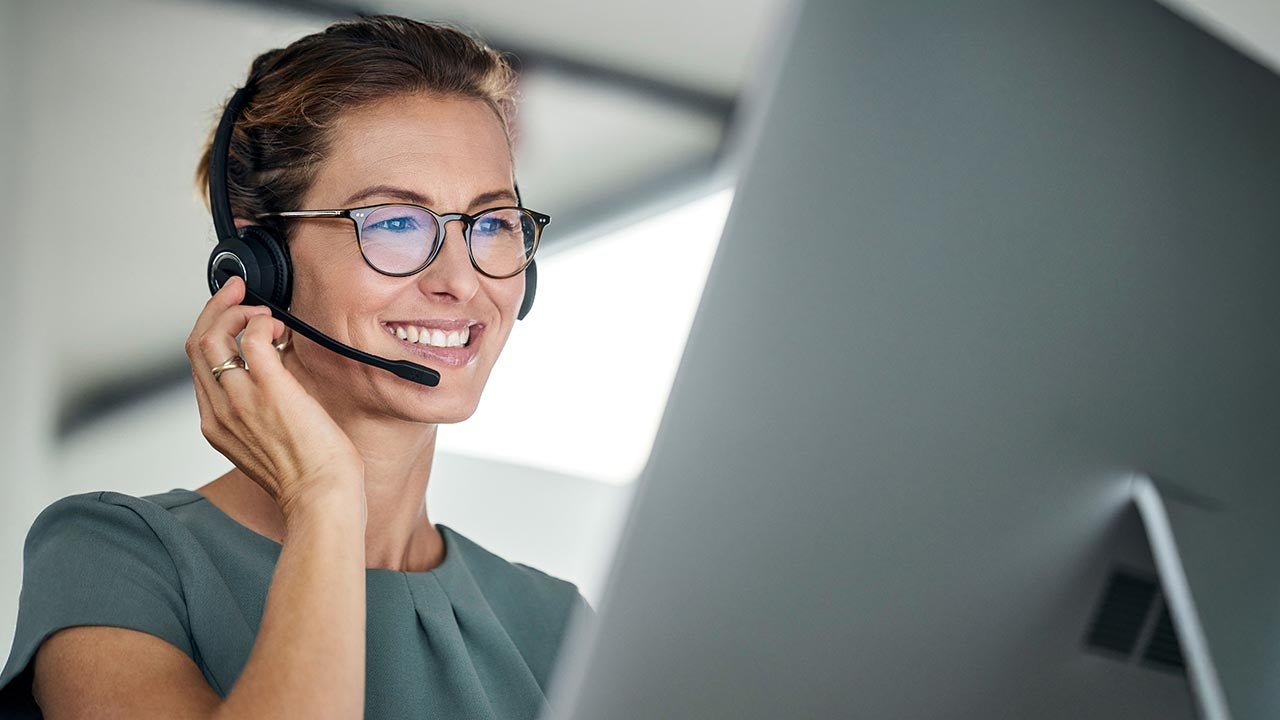 Call center employee taking a call.
