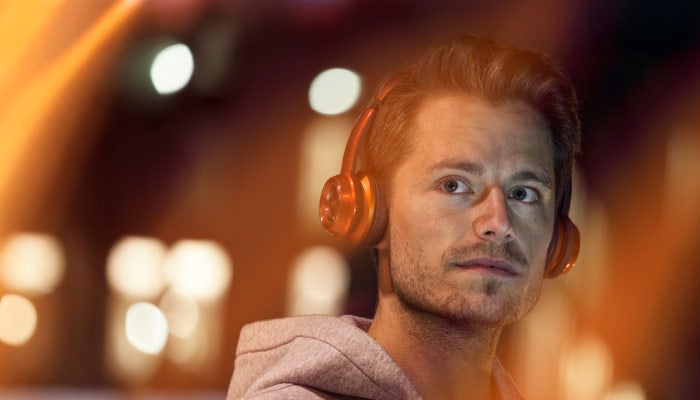 Woman looking into distance in front of phone