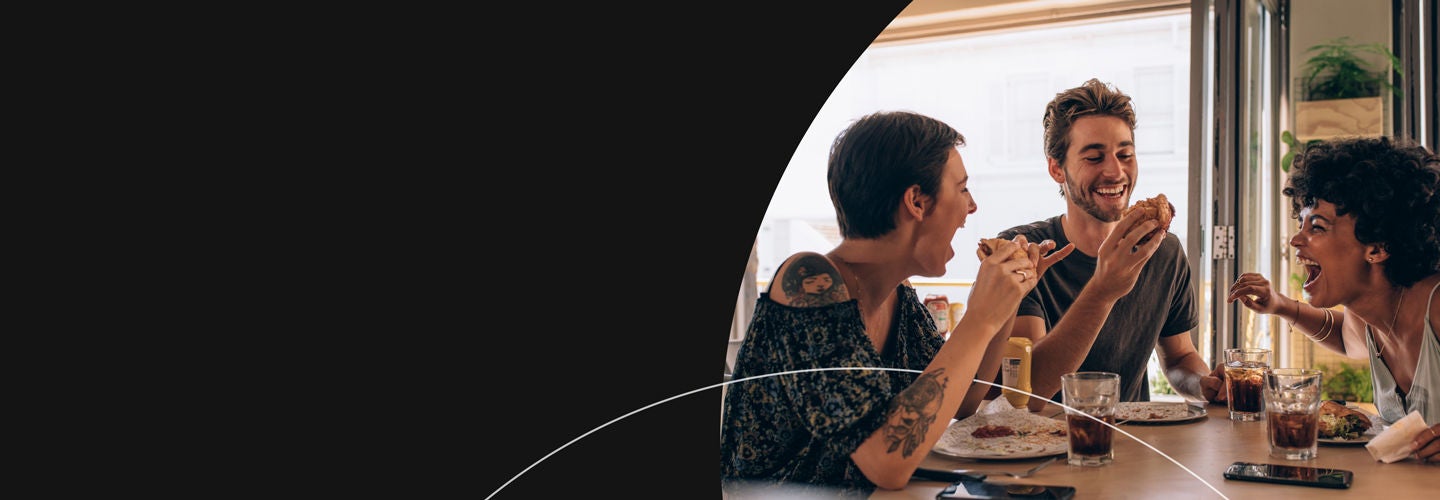 Friends having a good time over a meal at home