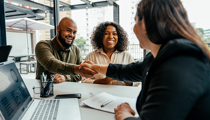 Couple meeting with their advisor