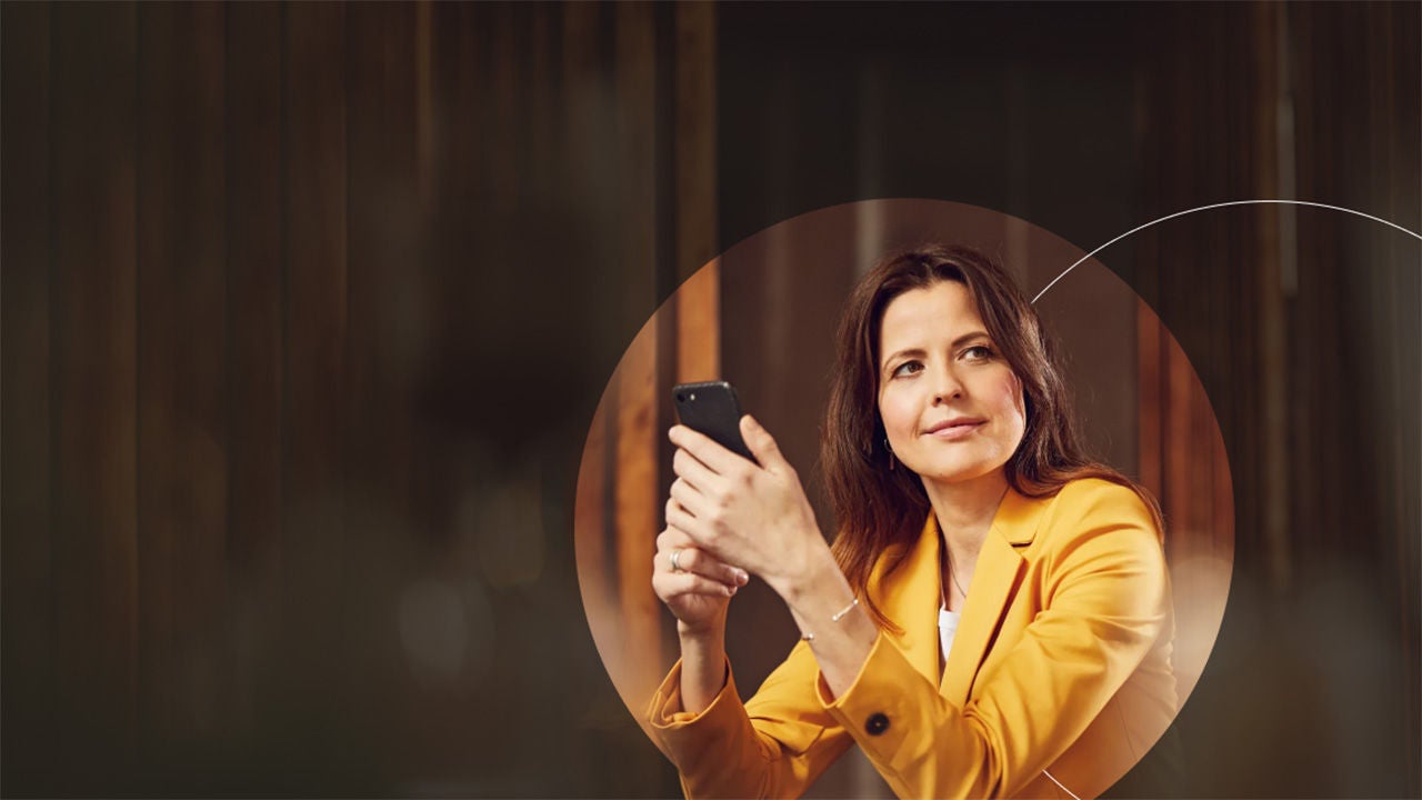 Woman looking over her shoulder in an office