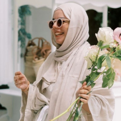 woman holding flowers