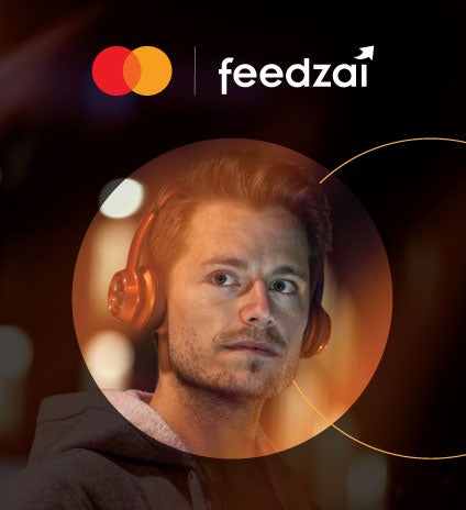 Man with headphones looking into the camera