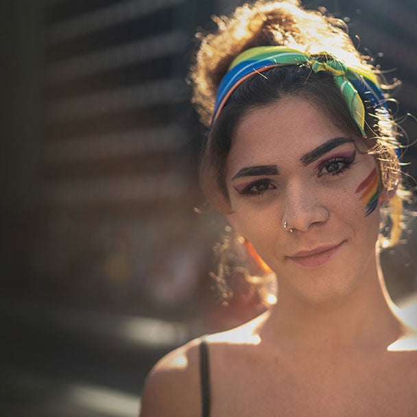 Person with colorful makeup.