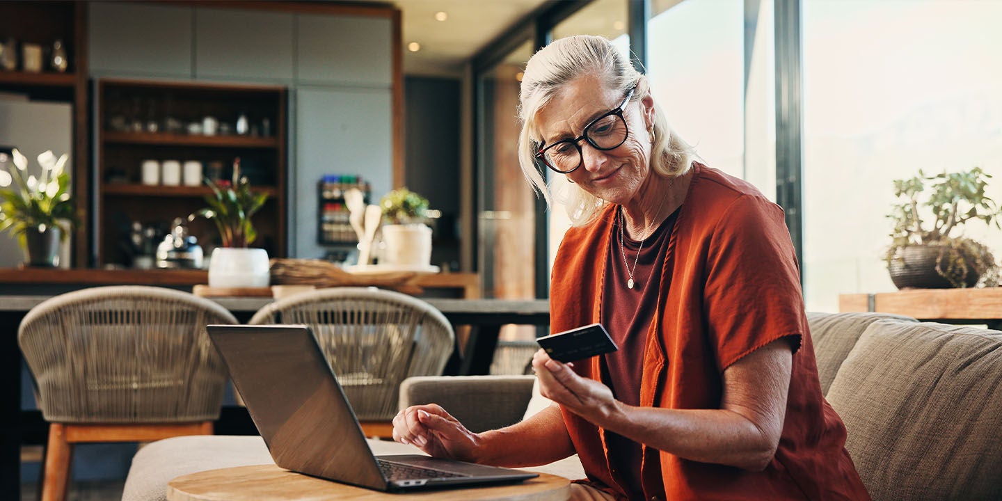 Woman making an online payment with a credit card