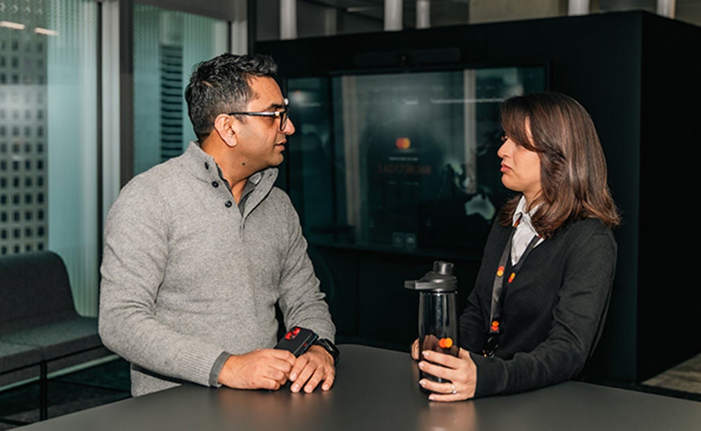 Mastercard employees talking