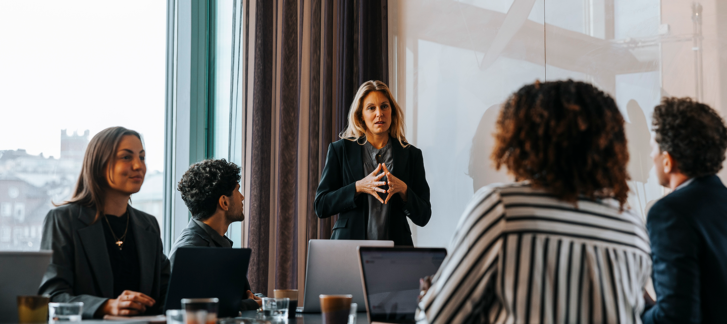 Woman giving a seminar to the team