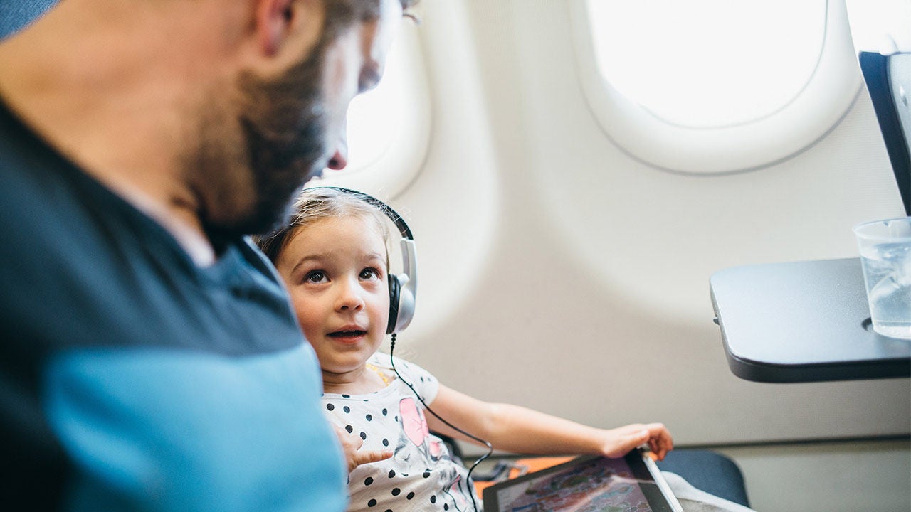 Man getting in a car.