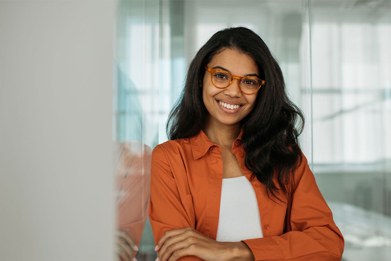 Woman wearing orange glasses