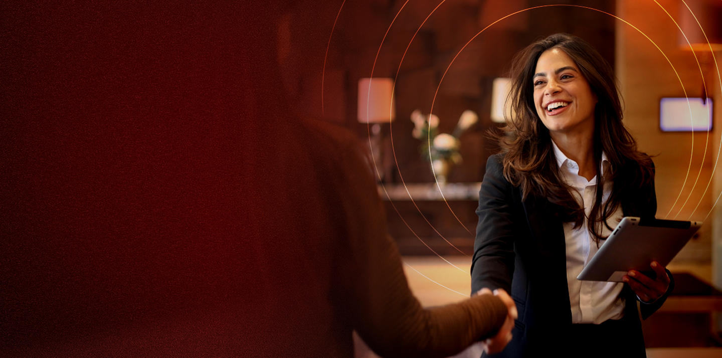 Lady in black blazer doing handshake