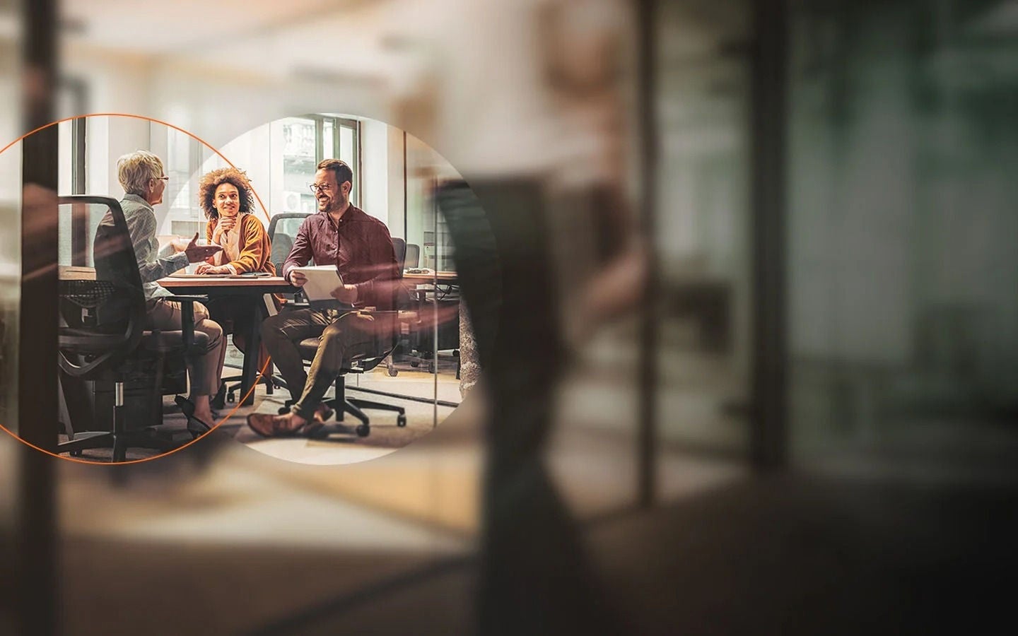 Coworkers in a meeting room brainstorming about commerce