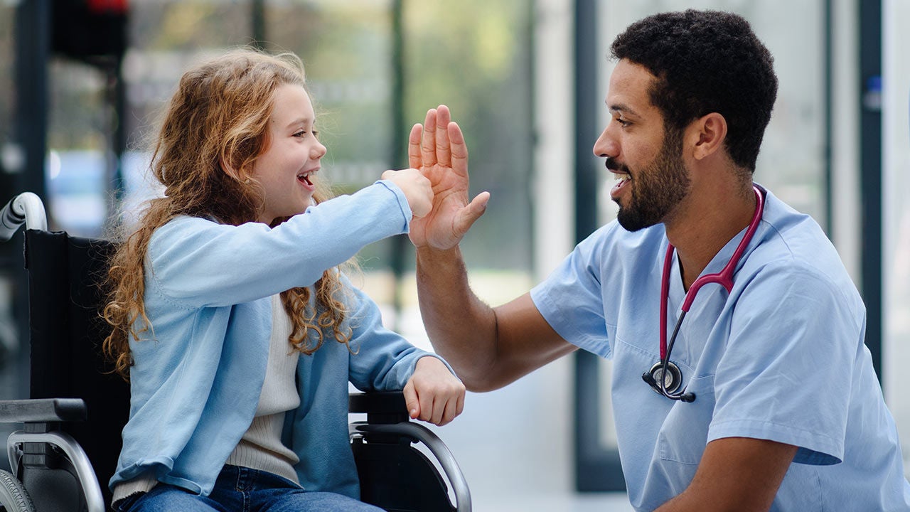A doctor with a child.