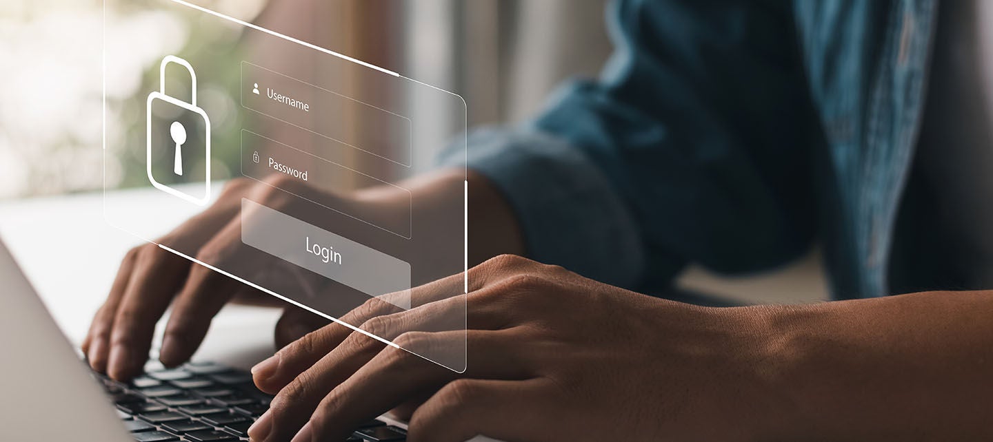 Person typing on laptop with digital login screen overlay showing username, password, and lock icon.