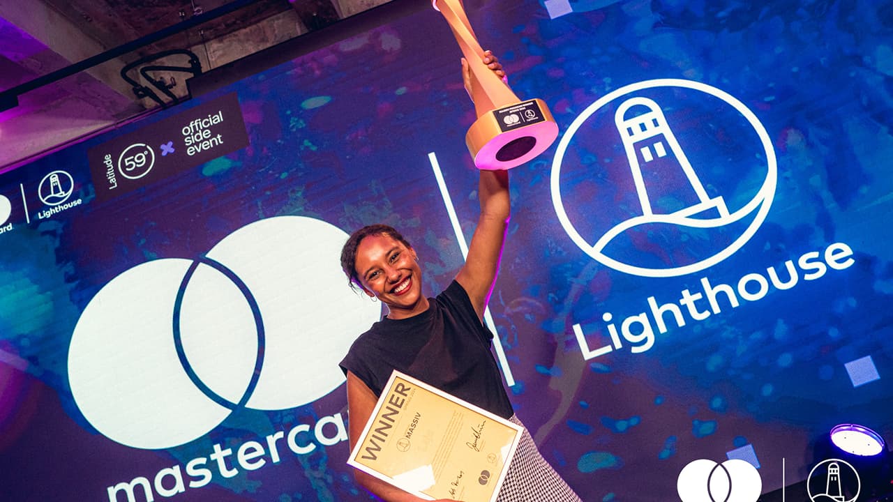 woman winner trophy lighthouse celebration 2024