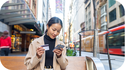 A person holding a cell phone in their hand