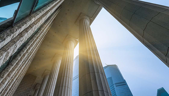 Sun peaking through columns
