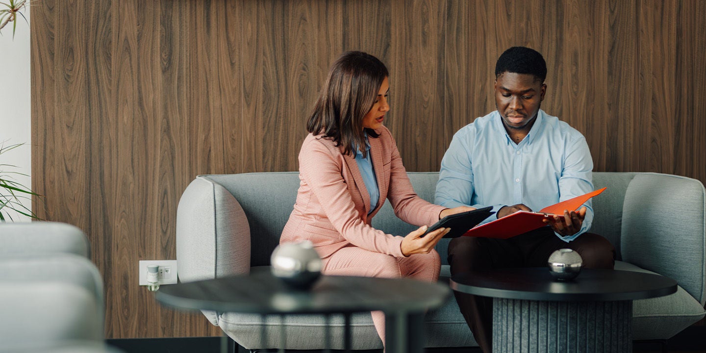 An employee talking to a customer
