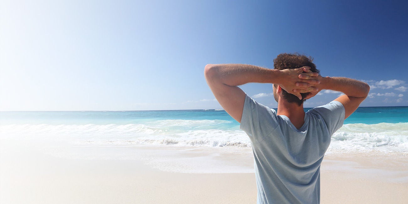 Guy enjoying the beach.