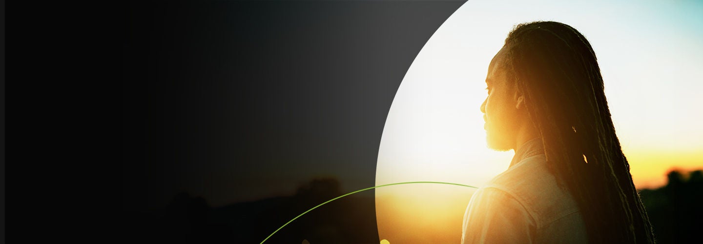 Man looking off into the sunset