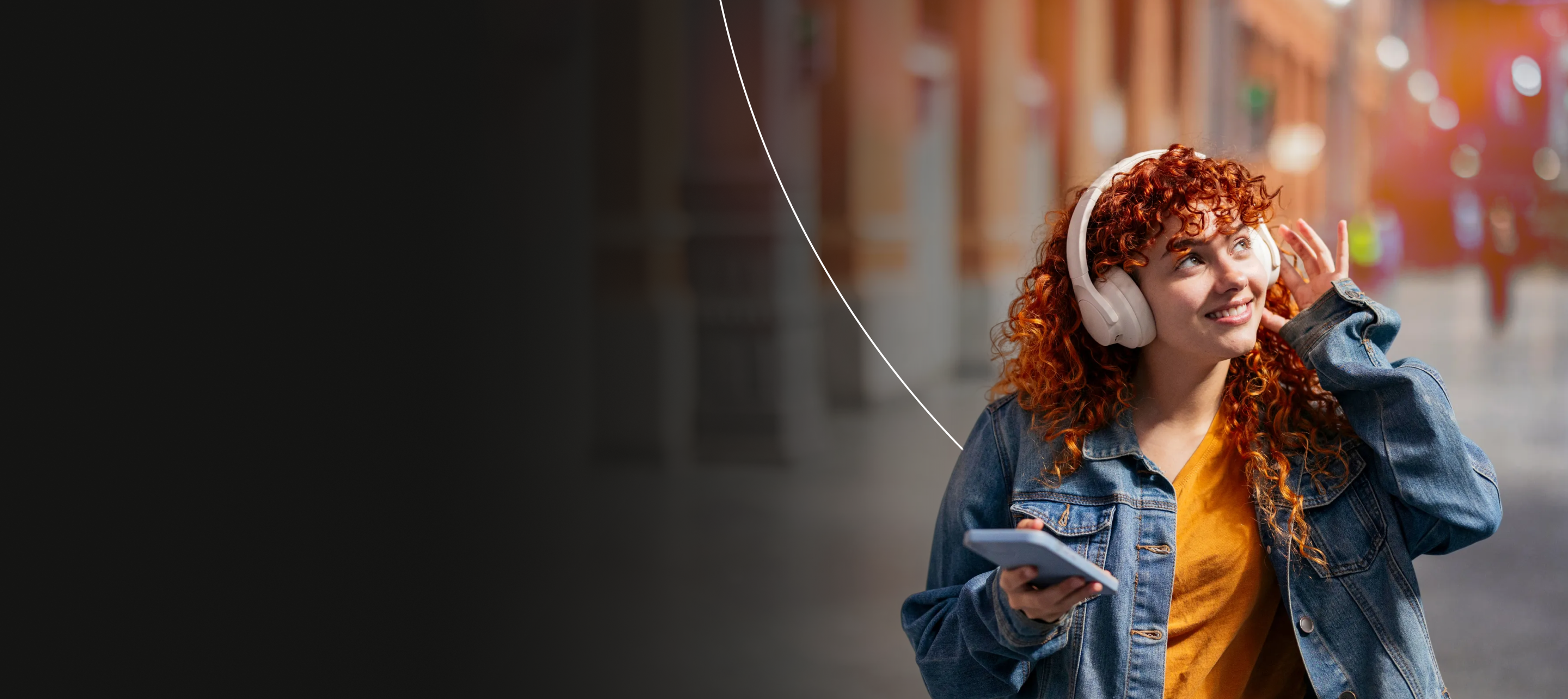 Woman listening to music on her headphones