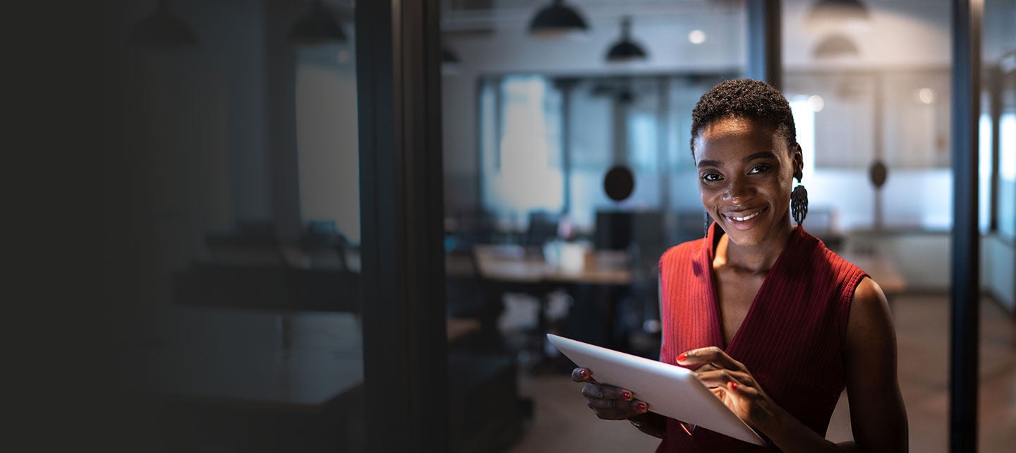 Smiling businesswoman at an office.