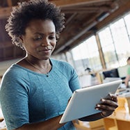 Woman using tablet.