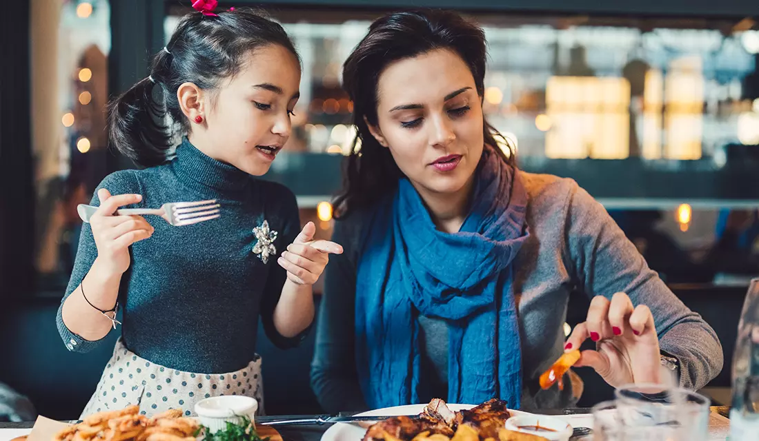 Pharmacist delivering medicine to a woman